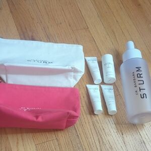 Dr. Barbara Sturm Skincare Collection with White and Pink Pouches